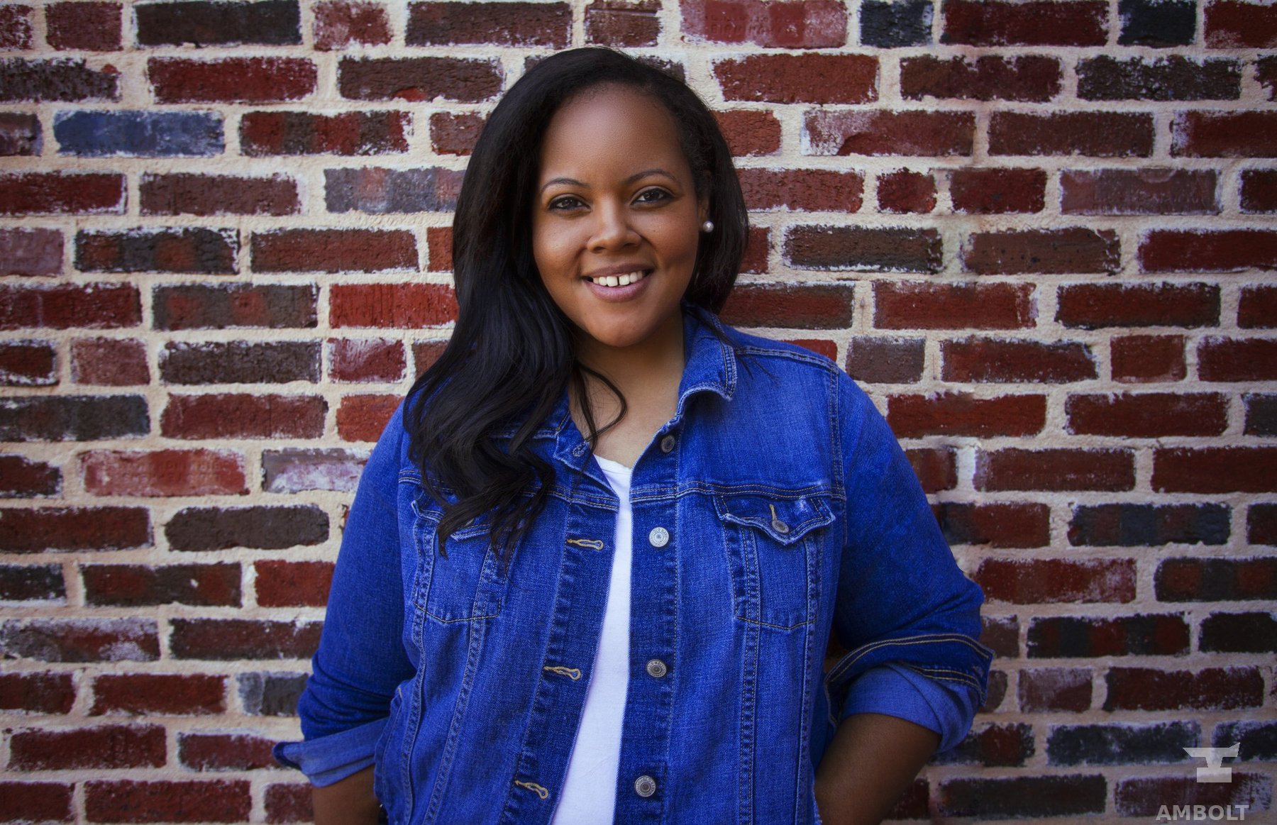 Business headshot against brick