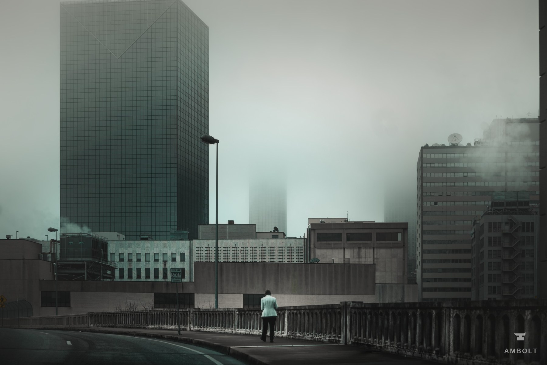 Office towers disappearing into fog